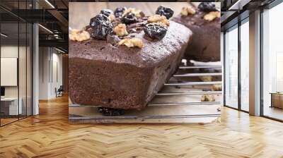 Chocolate cake with prune and walnuts Wall mural