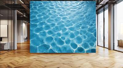 Close-up of a swimming pool's water surface from above, showcasing sunlight reflections creating intricate patterns, perfect for backgrounds or texture designs. Wall mural