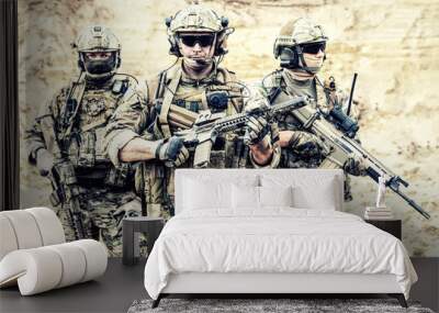 Group portrait of US army elite members, private military company servicemen, anti terrorist squad fighters standing together with guns. Brothers in arms, war conflict combatants, soldiers of fortune Wall mural