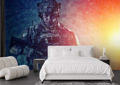 Soldier aiming service rifle under rain at night Wall mural