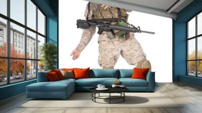 Studio shoot of army soldier in combat uniform and body armor, screaming, clutching chest, dropping weapons and falling down after being fatally shot in military firefight. Marine gets shot in battle Wall mural