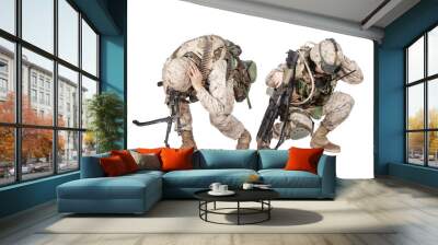 Two army soldiers in camo uniform, armed with assault rifle and machine gun, crouching to ground, holding helmets and covers ears with hands isolated on white studio shoot Grenade or bomb explosion Wall mural