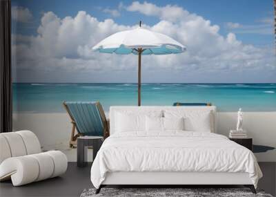 Two blue beach chairs under an umbrella on a beach. Summer season concept. Wall mural