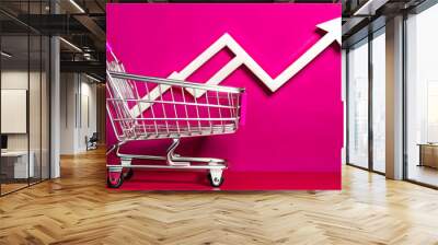 Shopping Cart with Arrow Vector concept as Abstract vector of a shopping cart with an upward pointing arrow inside isolated on a white background representing increased sales and Black Friday growth w Wall mural