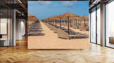 Parasols at Santa Maria beach in Sal Island - Cape Verde - Cabo Verde, background blue sky Wall mural