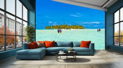 People walking true turquoise sandbank, Aitutaki island, Cook Islands, South Pacific. Copy space for text... Wall mural