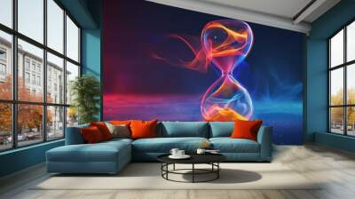 An hourglass with glowing sand and colorful smoke against a dark background. Wall mural