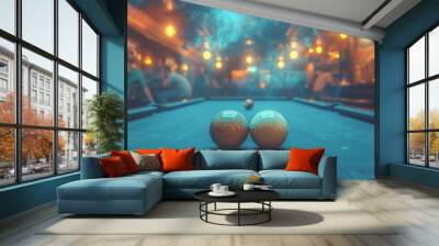 Two billiard balls on a green felt pool table in a dimly lit pub. Wall mural