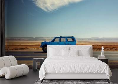 Peaceful summer road trip with blue SUV on a desert highway, offering ample copy space for text, ideal for adventure travel ads. Wall mural