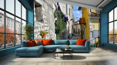 A narrow street among the old houses of Montesarchio, a village in the province of Benevento in Italy. Wall mural