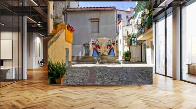 Narrow street in Diamante, a village in Calabria, Italy. Wall mural