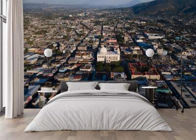 Beautiful aerial view of the City of San Salvador, capital of El Salvador - Its cathedrals and buildings Wall mural