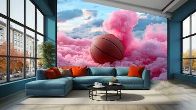 basketball emerges from vibrant pink smoke, creating striking visual against dramatic sky. scene captures sense of energy and excitement, perfect for sports enthusiasts Wall mural