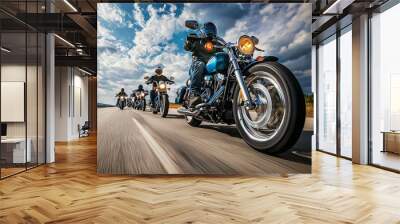 group of motorcyclists traveling together on scenic road, showcasing thrill of adventure and camaraderie. powerful bikes and dynamic sky create exhilarating atmosphere Wall mural