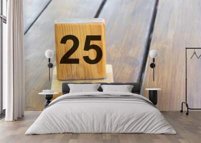 Wooden priority number 25 on a plank tab Wall mural