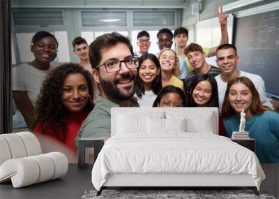 Happy selfie of young group of Erasmus students taking a photo with their teacher in the classroom. Wall mural