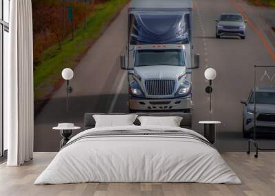 Heavy truck on a Canadian highway in the fall in Quebec Wall mural