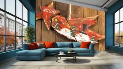 hanged red wooden decoration comet star shaped on wooden backgro Wall mural