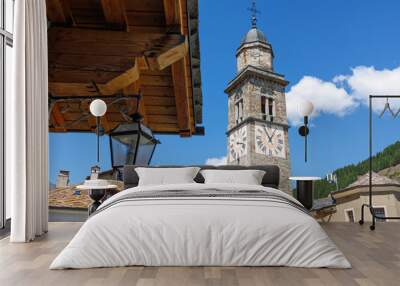 View of the Stone Bell Tower of the Church of Cogne in Aosta - Italy Wall mural