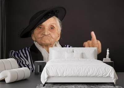 Old grandma in a white-black striped jacket Wall mural