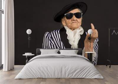 Old grandma in a white-black striped jacket Wall mural