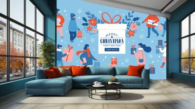 Christmas sale concept. People dressed in winter clothes shopping for Christmas holiday. Wall mural