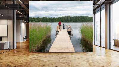 fishermans  at lake Zvirgzdu in the Latvia Wall mural