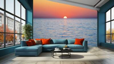 Calm sea sunset. Wall mural