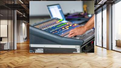 Sound engineer working at mixing panel Wall mural