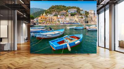 Leisure boats and traditional buildings in Cetara harbor, Amalfi coast, Italy. Wall mural