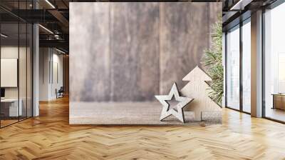 Christmas fir branch and decor, on the wooden background. Wall mural