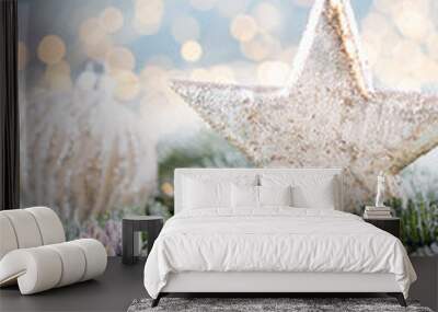 Christmas spruce with star and blurred shiny lights. Wall mural