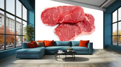 Fresh raw steaks on white background. Wall mural