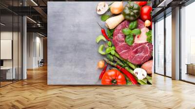 Raw fresh meat Ribeye Steak with vegetables and spice. Wall mural