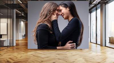 couple of women about to kiss each other Wall mural