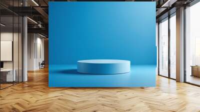 Empty pedestal display on blue background with stand for product show or presentation Wall mural