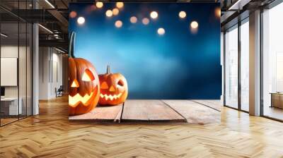 Two halloween lanterns with evil eyes and face on a wood table with a spooky dark blue background at night with light bokeh Wall mural