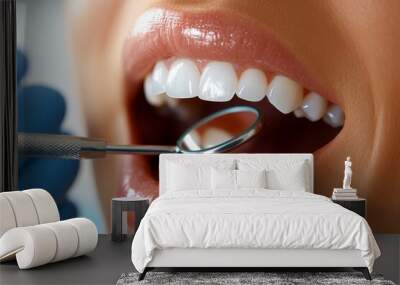 A woman mouth is open with a dental mirror in her mouth. Concept of cleanliness and good oral hygiene Wall mural