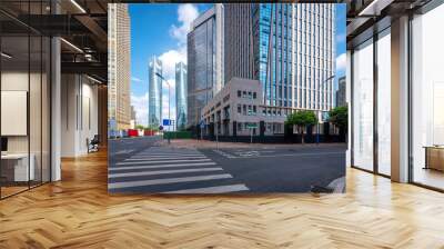 Empty urban road and buildings in the city Wall mural