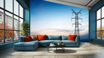 pylon and transmission power line in sunset Wall mural