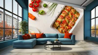 Baked pancakes with chicken in tomato sauce. Wall mural