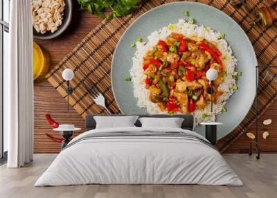 Chicken kung pao. Fried chicken pieces with peanuts and peppers. Wall mural