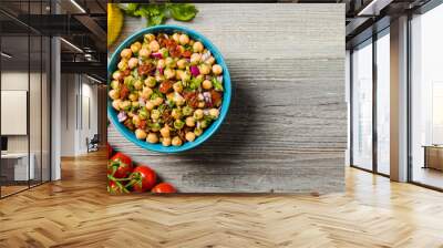 Chickpeas salad with onion and dried tomatoes. Wall mural