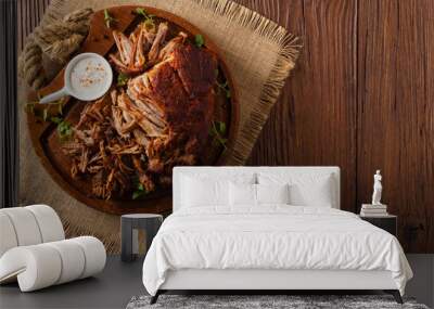 Pulled pork on a wooden board. Top view. Wall mural