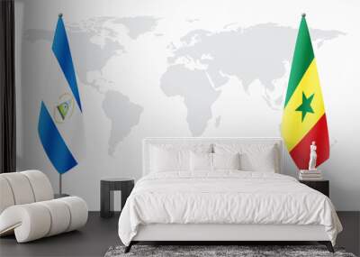 Nicaragua and Senegal flags for official meeting Wall mural