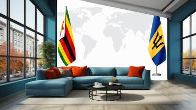 Zimbabwe and Barbados flags for official meeting against background of world map. Wall mural