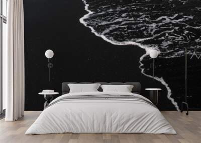 white ocean foam on black sand volcanic texture Wall mural