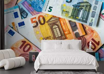 Euro banknotes of different denominations background. Wall mural