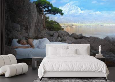 Sleeping woman rest on airbed, amazing landscape nature view Wall mural