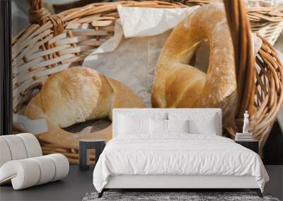 Two fresh sweet bagels on a wicker rustic basket Wall mural